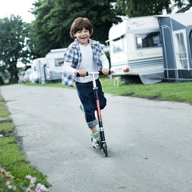 Child playing on a campsite in Denmark