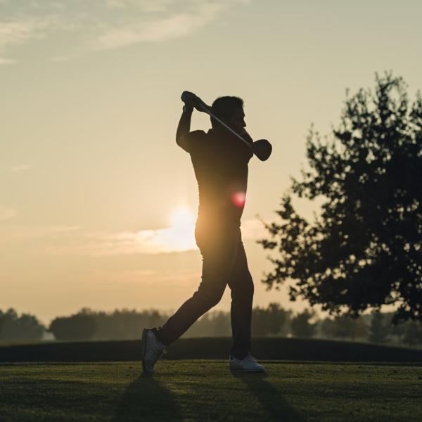 Golfing session during sunset at golf center on Møn, South Zealand
