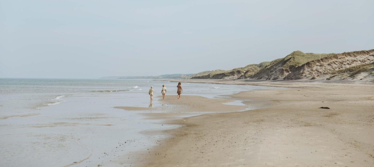 Children running on the beach on Skallerup Strand, Lønstrup