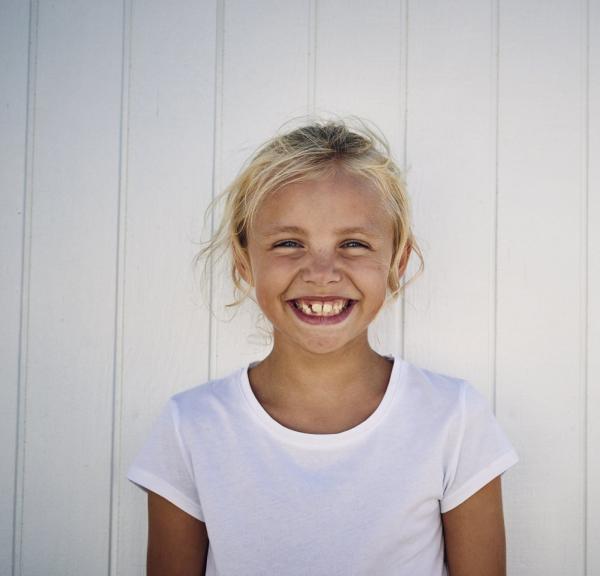 Girl smiling at beach in North Jutland, Denmark