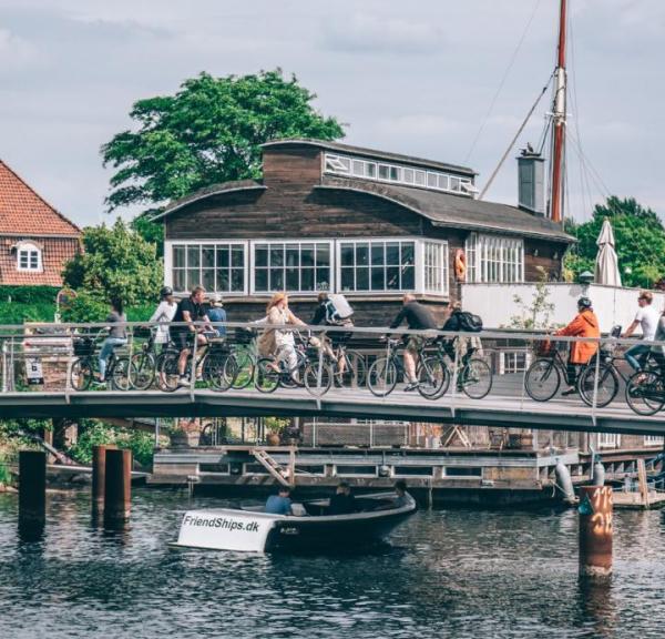 Cyclists crossing a bridge in Copenhagen