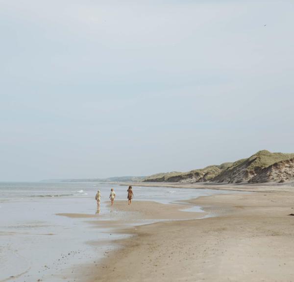 Children running on the beach on Skallerup Strand, Lønstrup